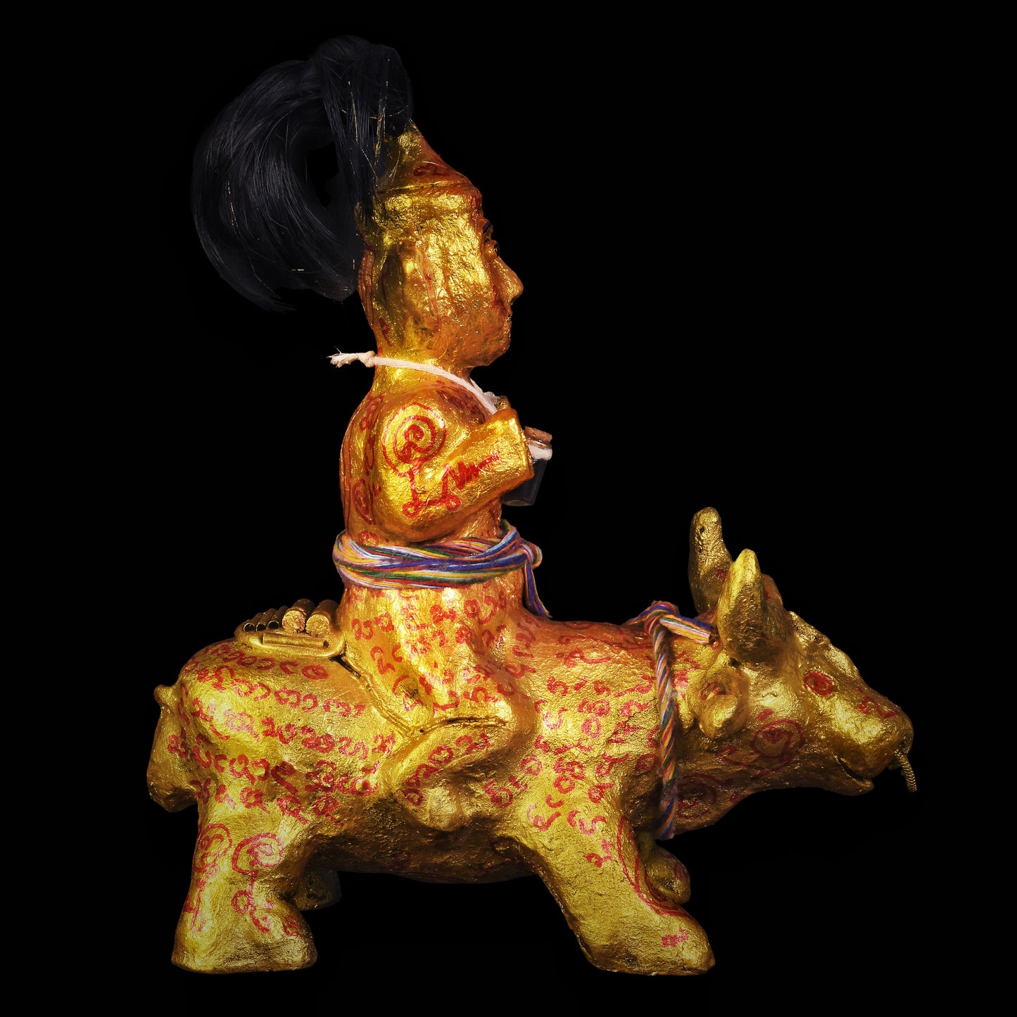 阿赞萨维特 · 古曼骑牛